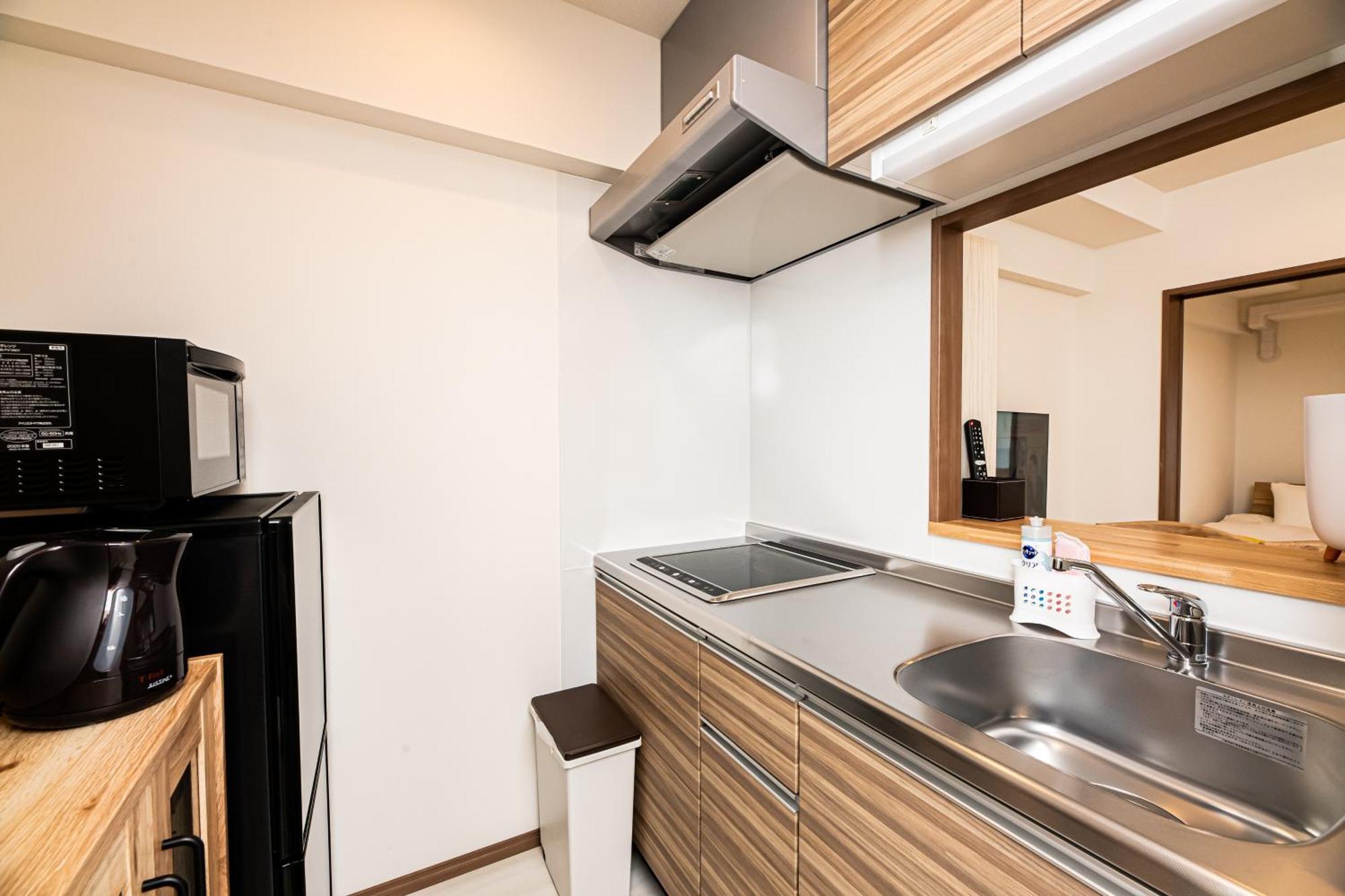 פוקואוקה Tomariehotel & Condominium מראה חיצוני תמונה